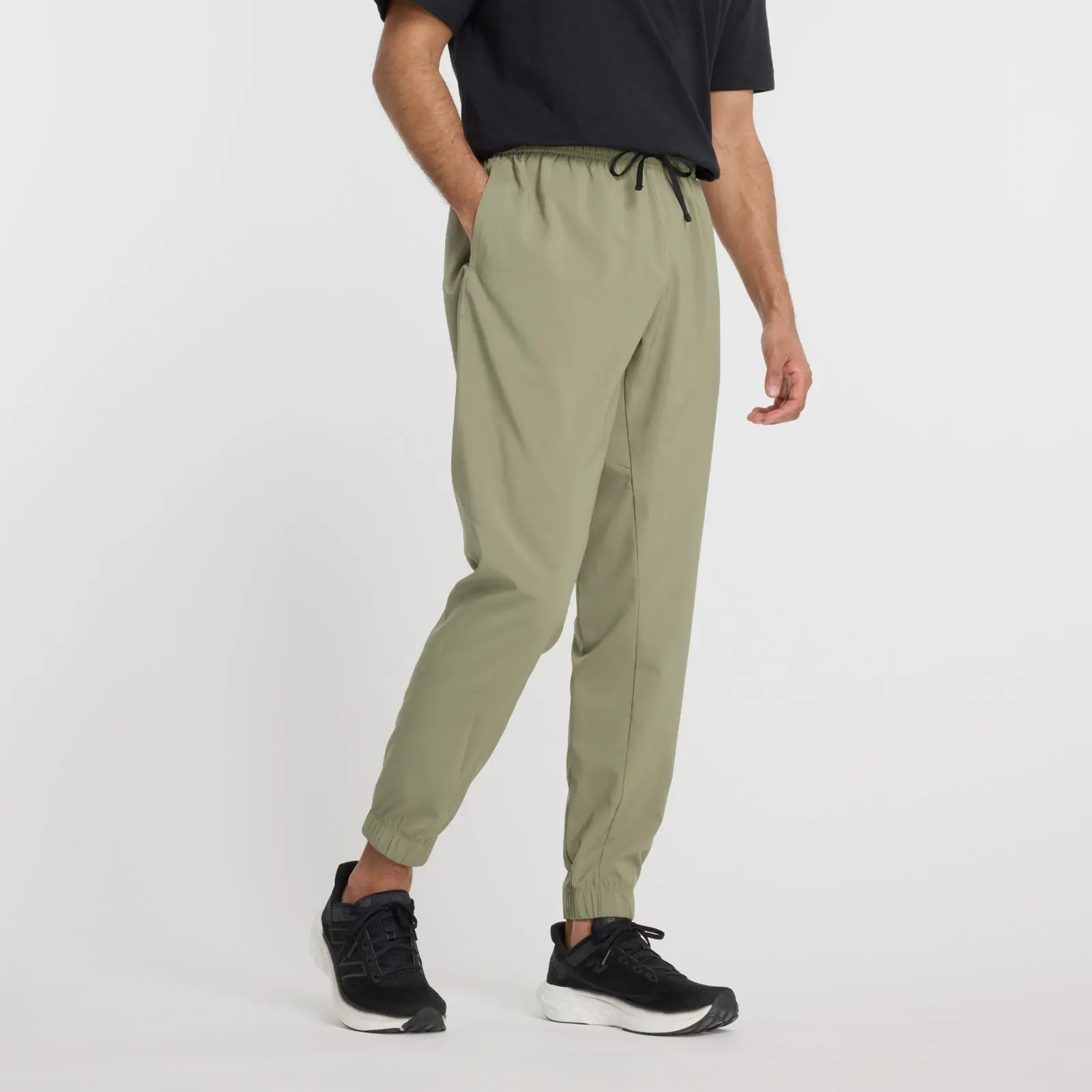 New Balance Sport Essentials Woven Jogger MP41011, Dark olivine, swatch