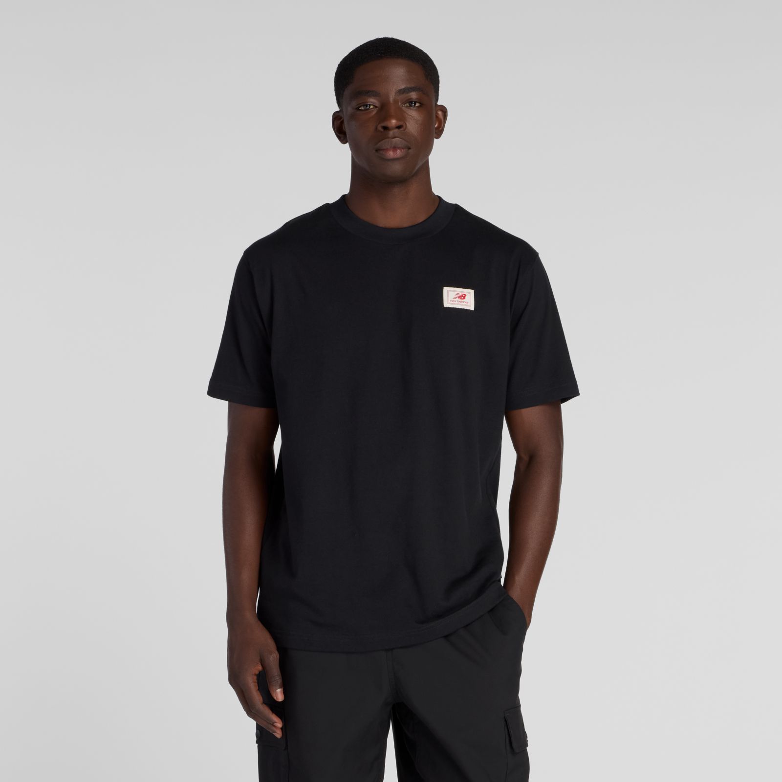 New Balance Remera Woven Label MTA53928, black, swatch