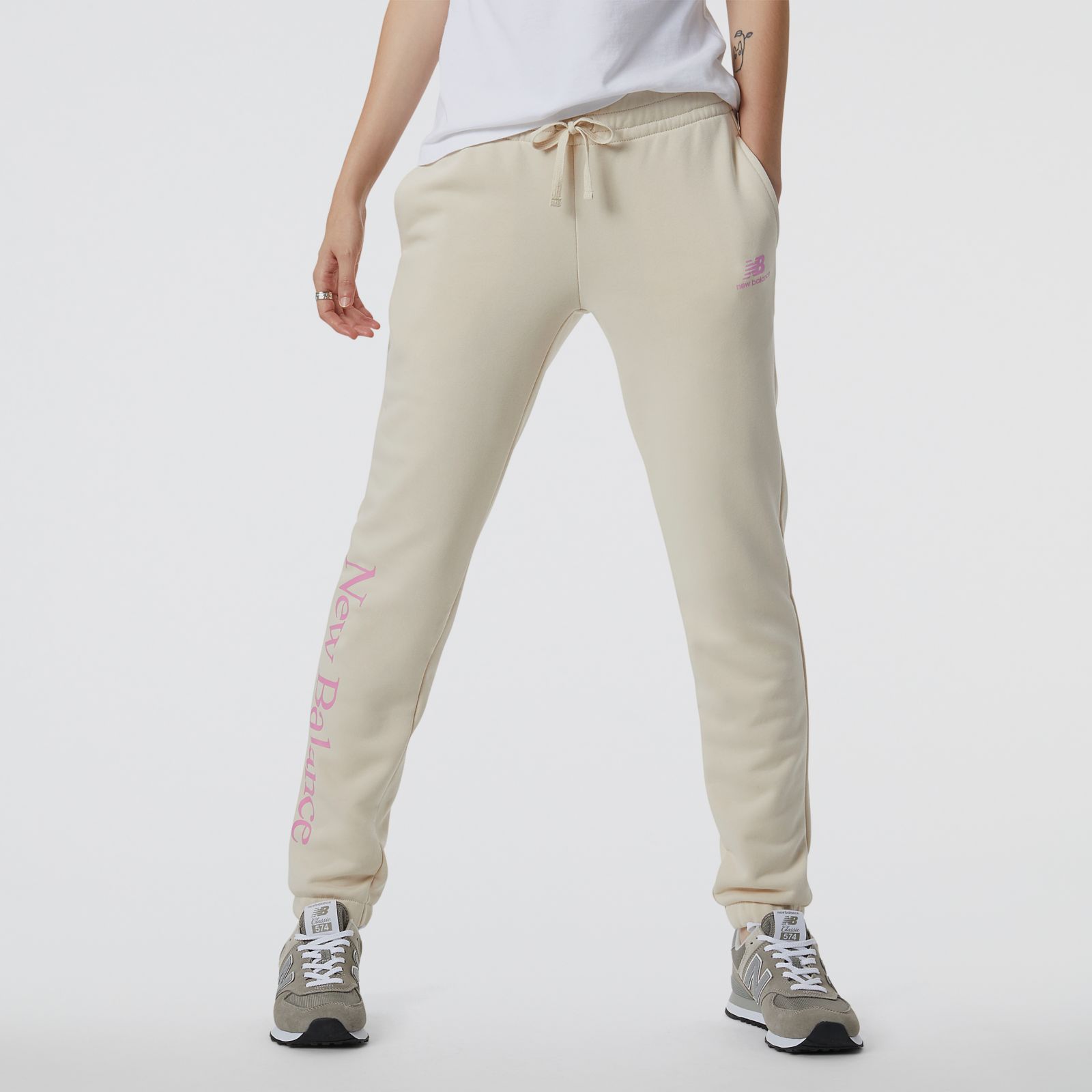 New Balance Pantalón Essentials Celebrate Fleece WP21508, Beige, swatch