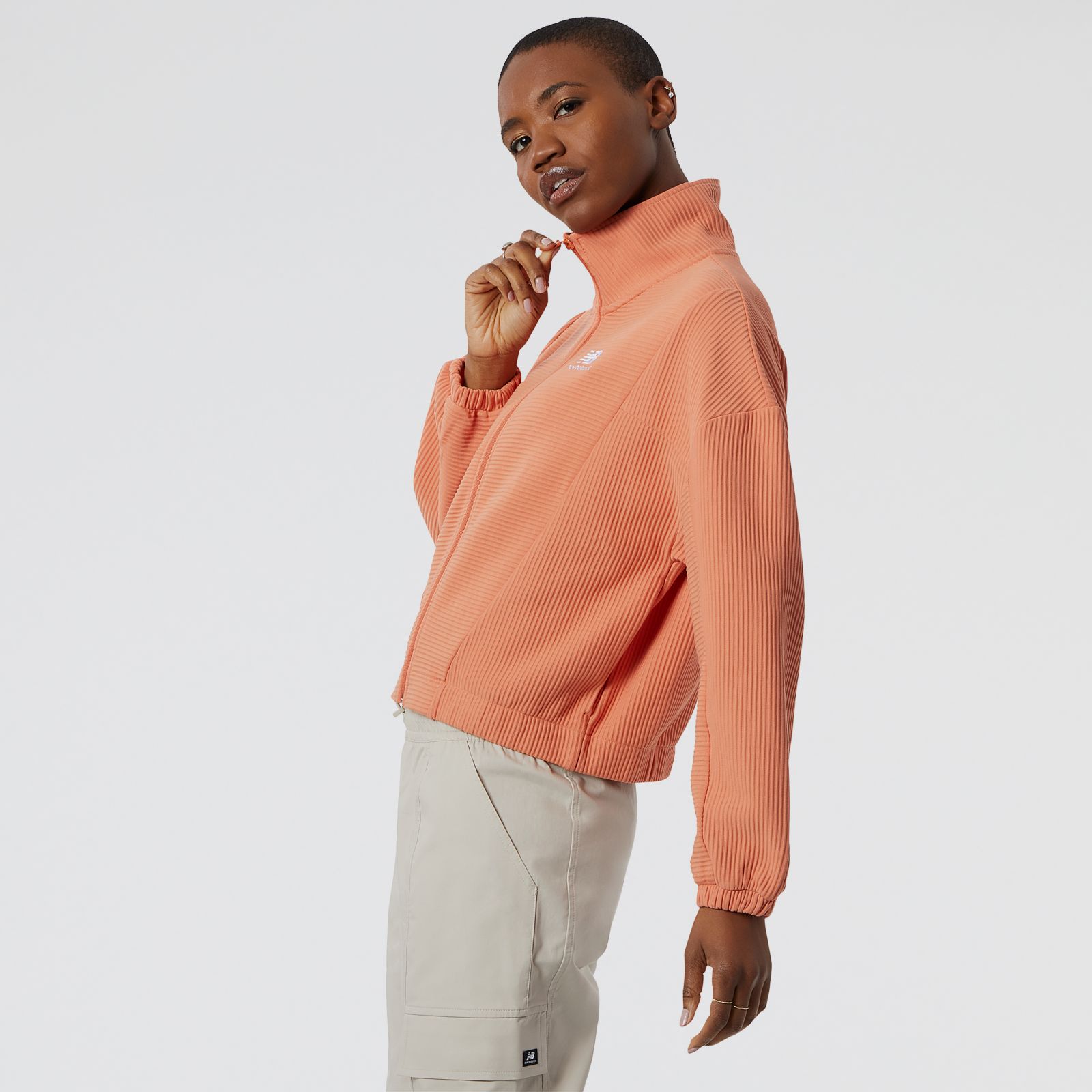 Campera new balance athletics top